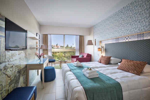 Family room at Leonardo Laura Beach & Splash Resort with inland view